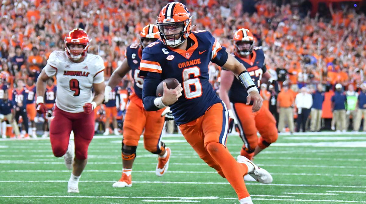 Sep 3, 2022; Syracuse, New York, USA; Syracuse Orange quarterback Garrett Shrader (6) runs for a touchdown against the Louisville Cardinals in the fourth quarter at JMA Wireless Dome.