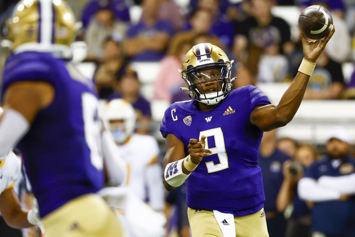 Sep 3, 2022; Seattle, Washington, USA; Washington Huskies quarterback Michael Penix Jr. (9) passes against the Kent State Golden Flashes during the first quarter at Alaska Airlines Field at Husky Stadium