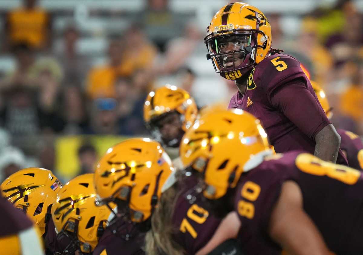 Sep 1, 2022; Tempe, Arizona, USA; Arizona State Sun Devil quarterback Emory Jones lines up to hike the ball against the Northern Arizona Lumberjacks at Sun Devil Stadium