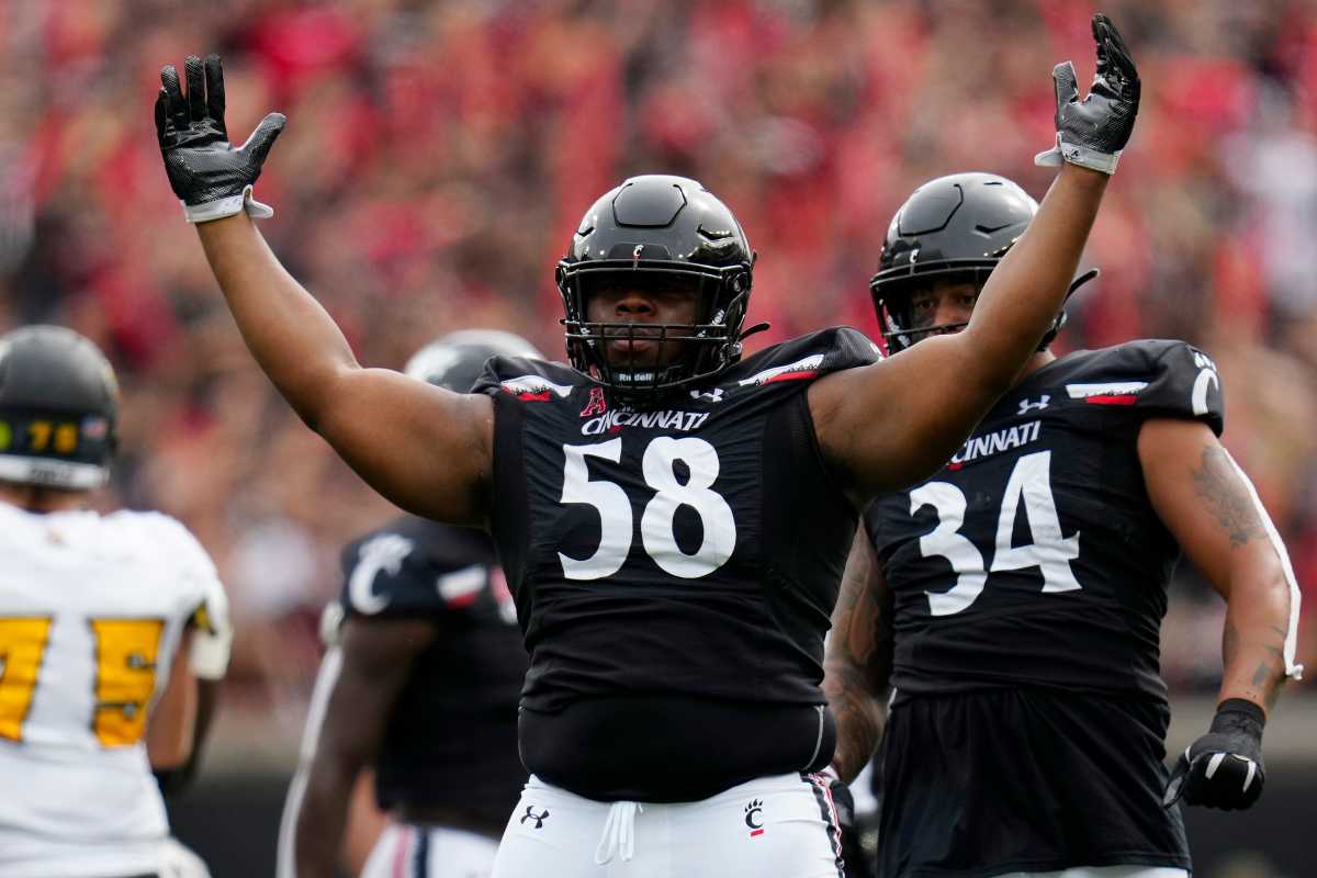 Cincinnati Bearcats defensive lineman Dontay Corleone (58) celebrates a sack in the first quarter of the NCAA football game between the Cincinnati Bearcats and the Kennesaw State Owls at Nippert Stadium in Cincinnati on Saturday, Sept. 10, 2022. Kennesaw State Owls At Cincinnati Bearcats Football