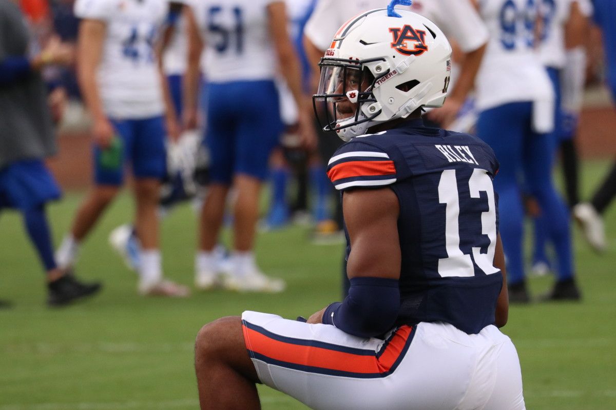 Cam Riley stretches before the Tigers and the Spartans kickoff.
