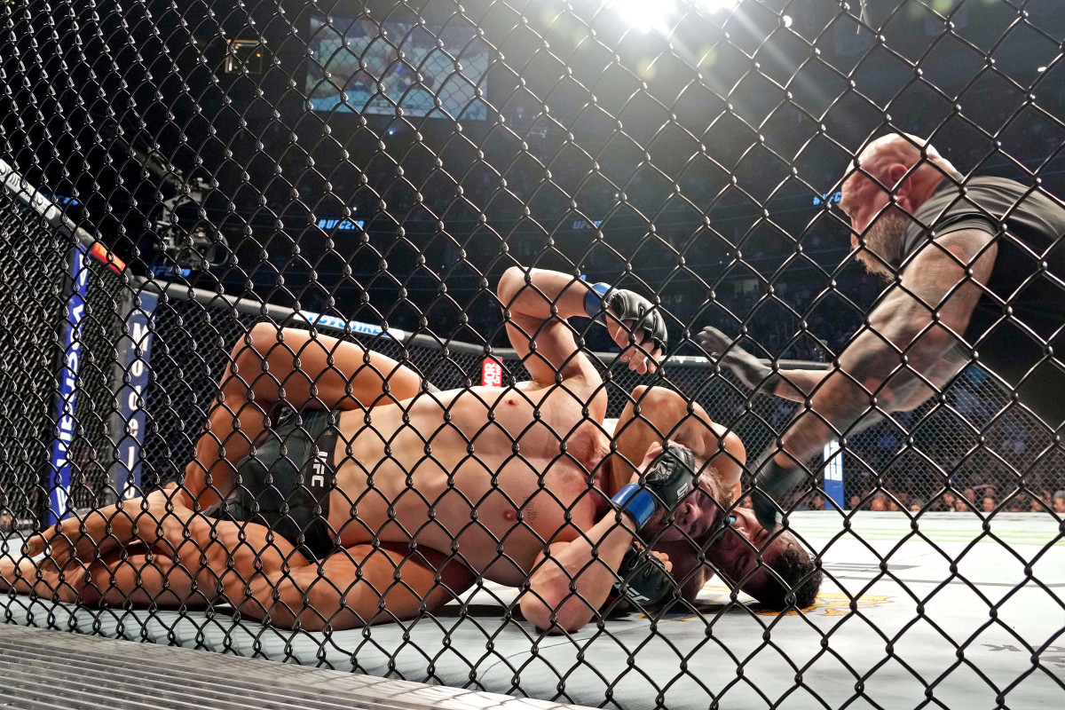 Johnny Walker fights Ion Cutelaba during UFC 279 at T-Mobile Arena.