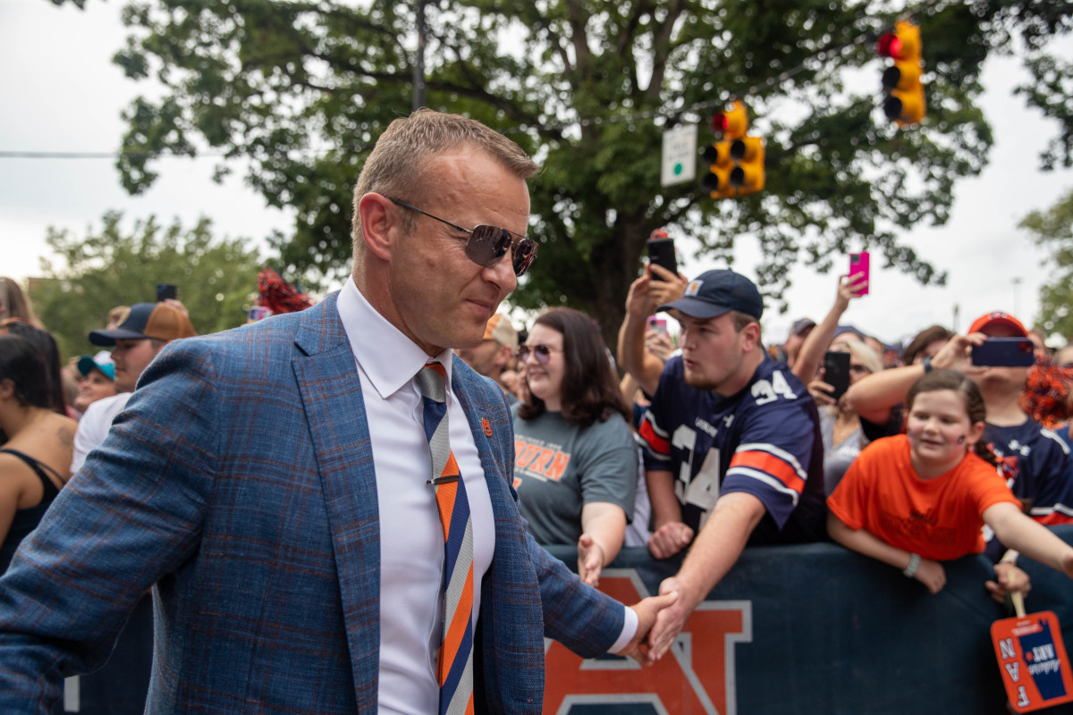 Auburn Tigers head coach Bryan Harsin greets fans along the Tiger Walk trail prior to the San Jose State vs Auburn game on Saturday, Sept. 10, 2022.