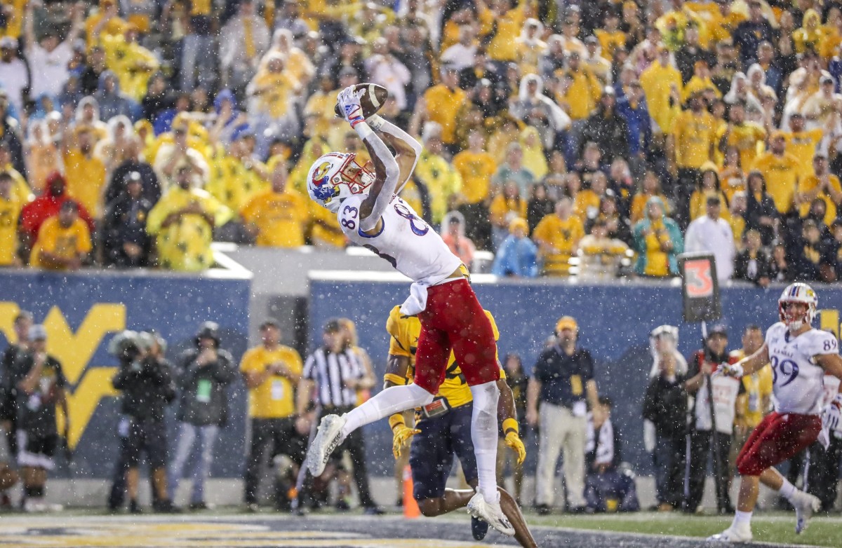 Sep 10, 2022; Morgantown, West Virginia, USA; Kansas Jayhawks wide receiver Quentin Skinner (83) catches a touchdown pass during overtime against the West Virginia Mountaineers at Mountaineer Field at Milan Puskar Stadium.