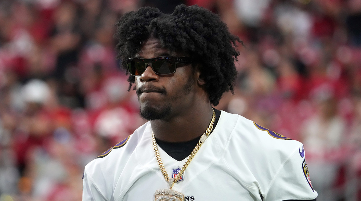 Lamar Jackson on the sidelines for a Ravens preseason game.