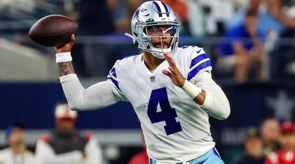 Sep 11, 2022; Arlington, Texas, USA; Dallas Cowboys quarterback Dak Prescott (4) throws during the first quarter against the Tampa Bay Buccaneers at AT&T Stadium. Mandatory Credit: Kevin Jairaj-USA TODAY Sports