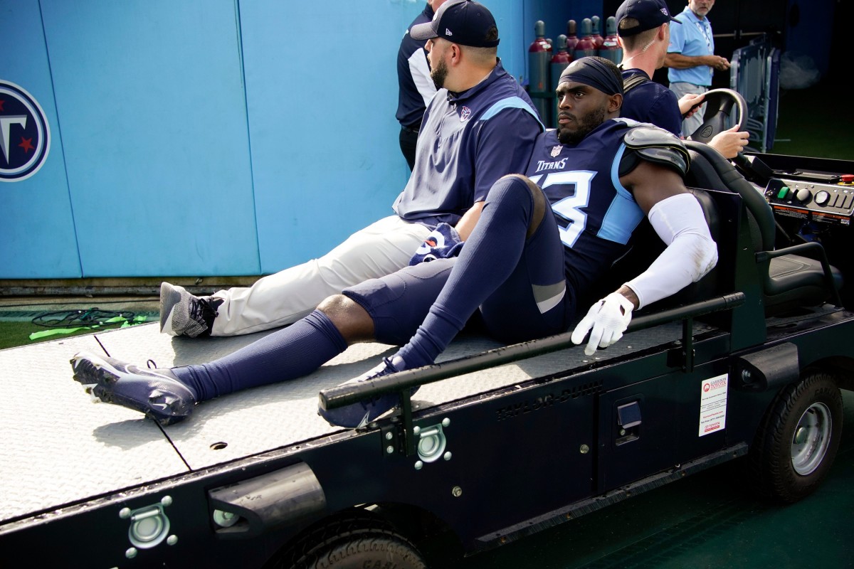 Tennessee Titans safety A.J. Moore (33) is carted off the field after an injury during the first quarter at Nissan Stadium Sunday, Sept. 11, 2022, in Nashville, Tenn.