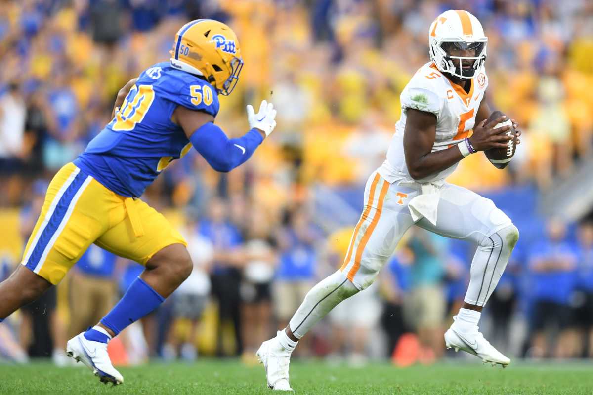 Tennessee quarterback Hendon Hooker (5) scrambles with the ball during the second half of a game between the Tennessee Volunteers and Pittsburgh Panthers in Acrisure Stadium in Pittsburgh, Saturday, Sept. 10, 2022. Tennpitt0910 03254