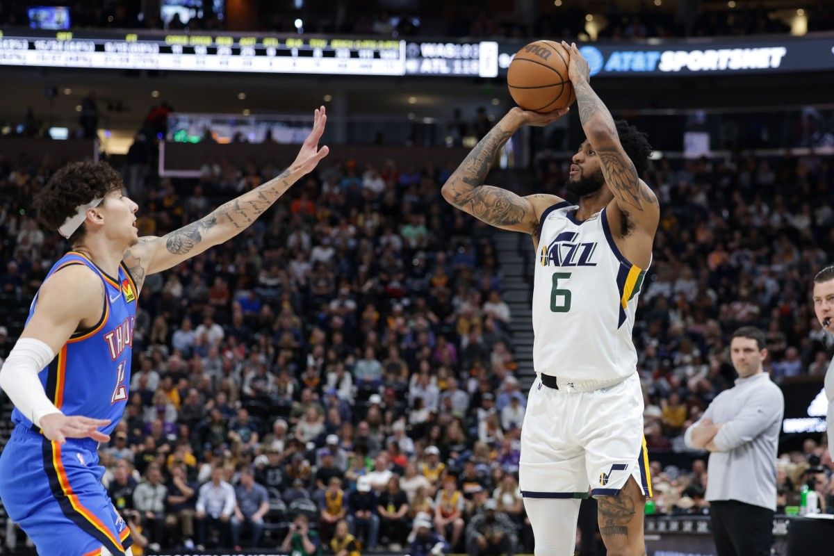 Utah Jazz guard Nickeil Alexander-Walker (6) shoots the ball against Oklahoma City Thunder forward Lindy Waters III (12) during the second half at Vivint Arena. Utah Jazz won 137-101.