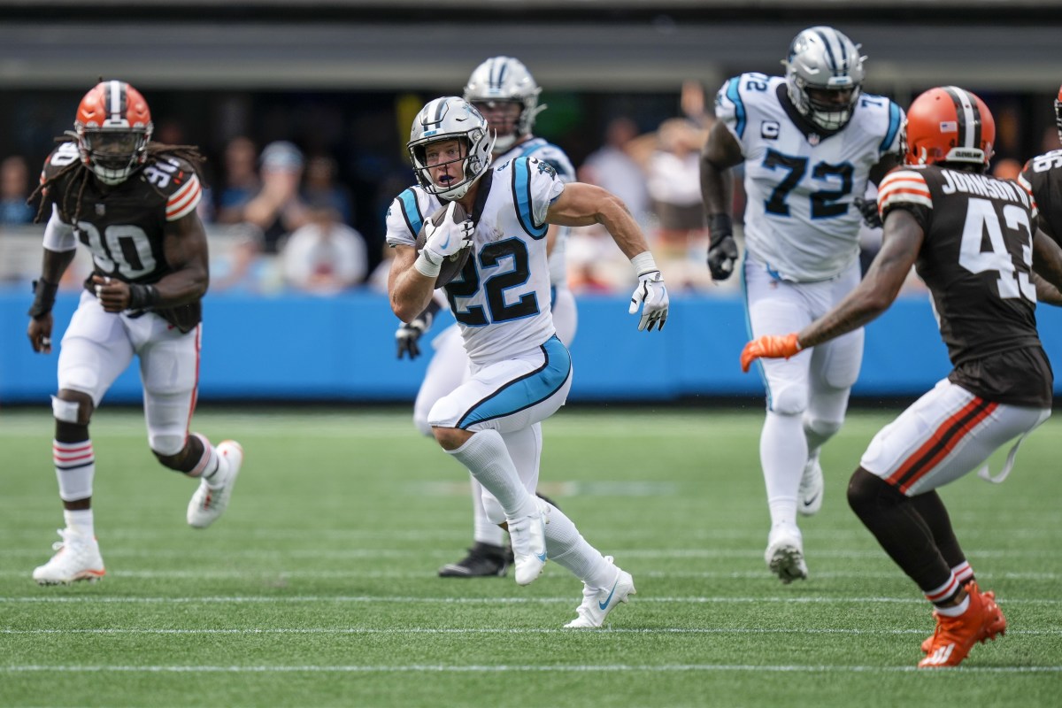 Charlotte, North Carolina, USA; Carolina Panthers running back Christian McCaffrey (22) breaks into open field during the second half against the Cleveland Browns at Bank of America Stadium.