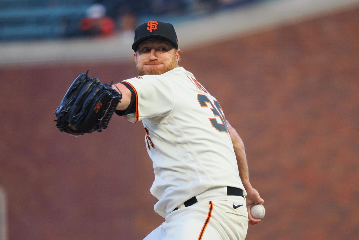 SF Giants pitcher Alex Cobb throws a pitch against Atlanta.