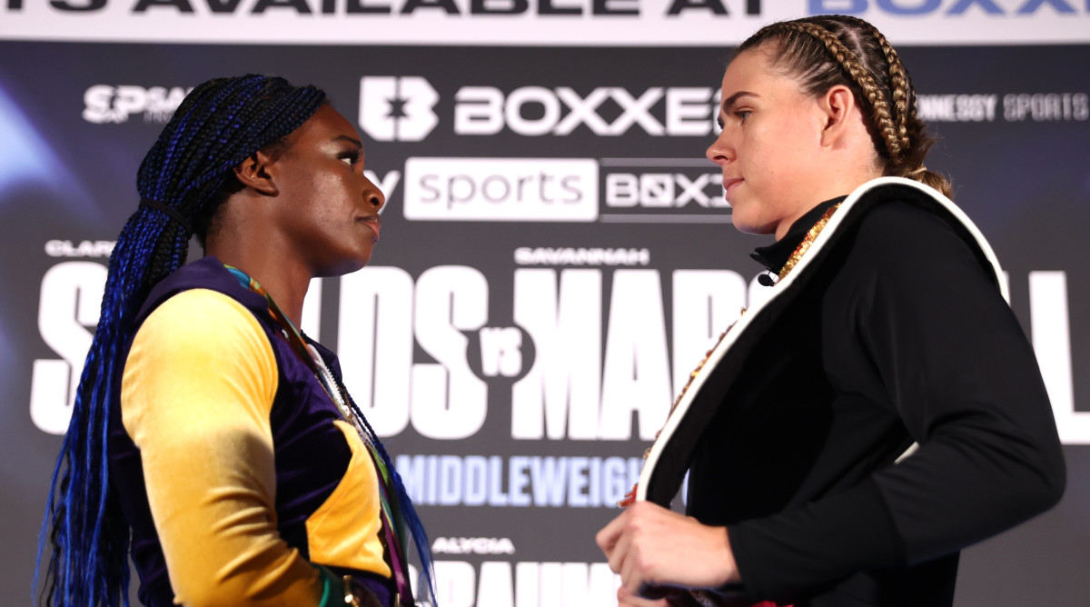 Claressa Shields (L) and Savannah Marshall (R) face-off during the press conference ahead of their undisputed middleweight championship fight at Canary Riverside Plaza Hotel on September 08, 2022 in London, England.