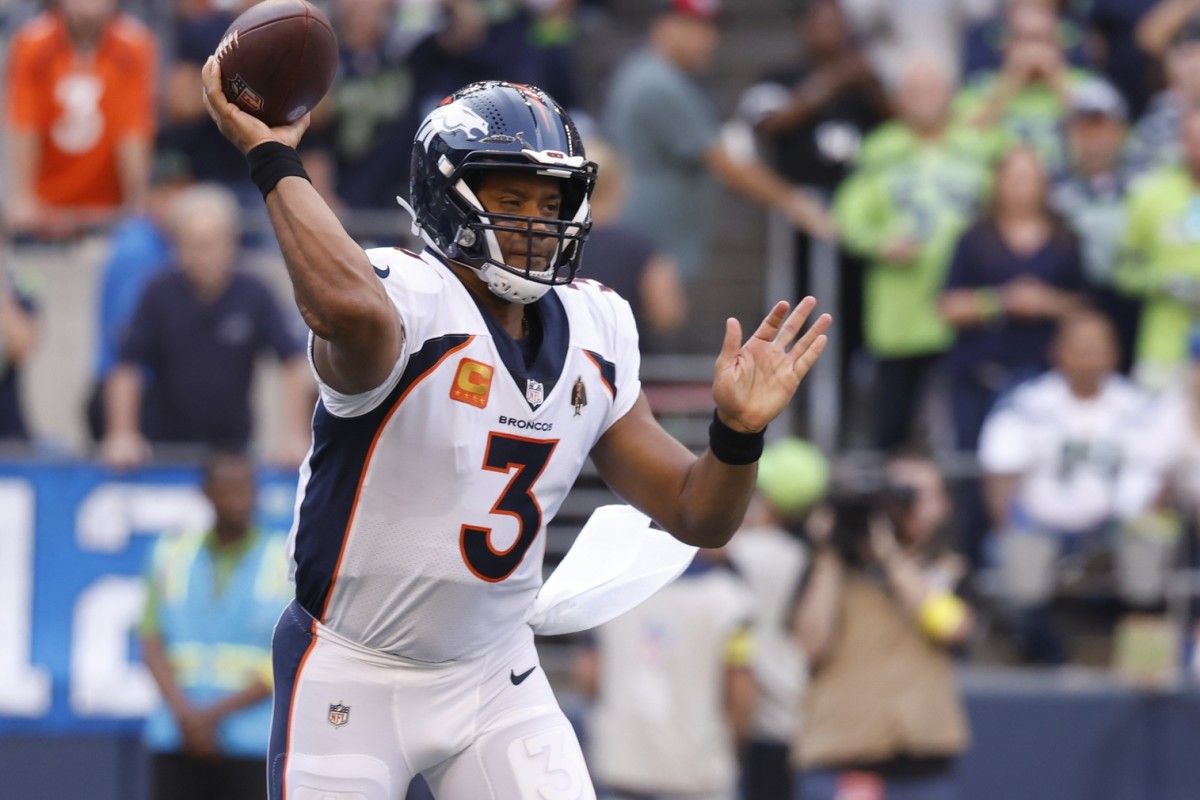 Denver Broncos quarterback Russell Wilson (3) passes against the Seattle Seahawks during the first quarter at Lumen Field.