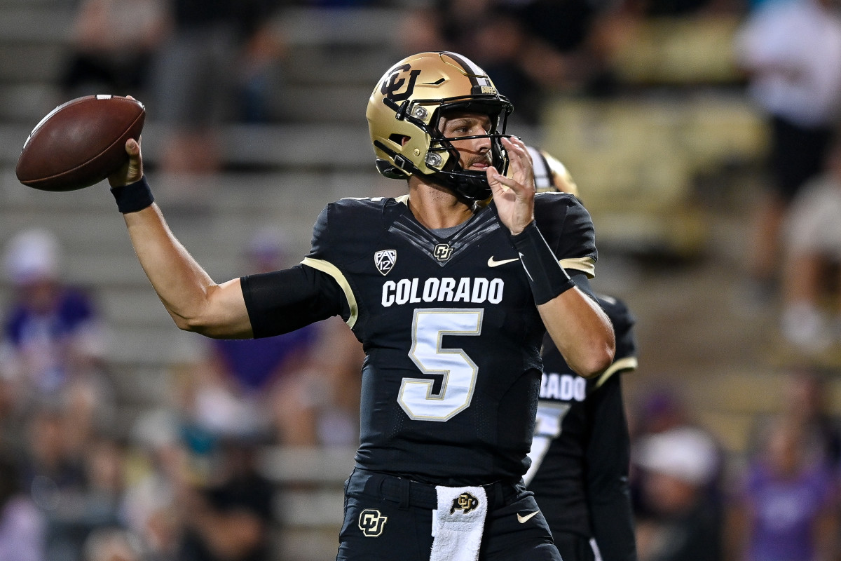 Quarterback J.T. Shrout #5 of the Colorado Buffaloes warms up before a game against the TCU Horned Frogs at Folsom Field on September 2, 2022 in Boulder, Colorado.