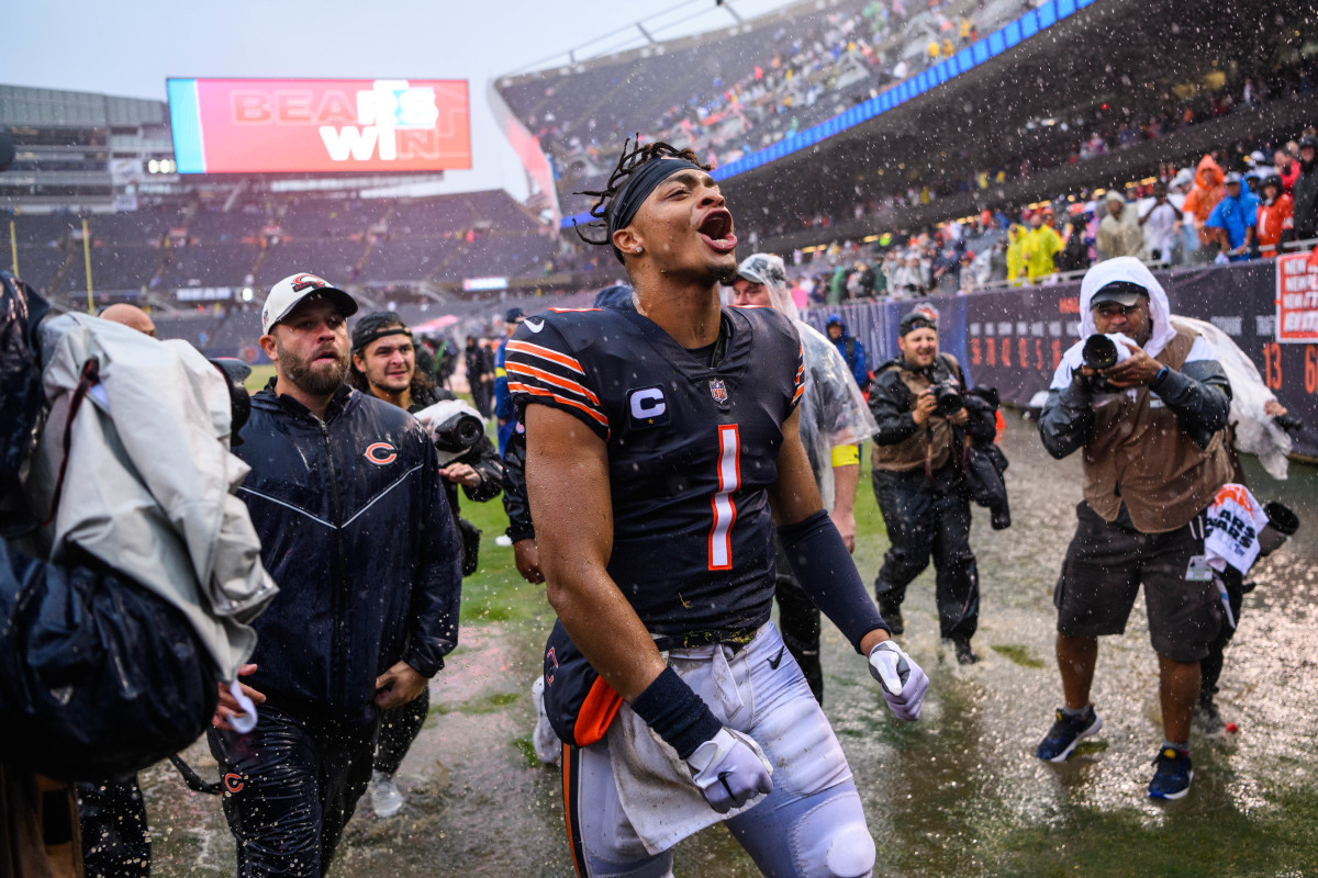 Justin Fields was happy to be walking through the slop after beating the 49ers. (Daniel Bartel/USA Today Sports Images)