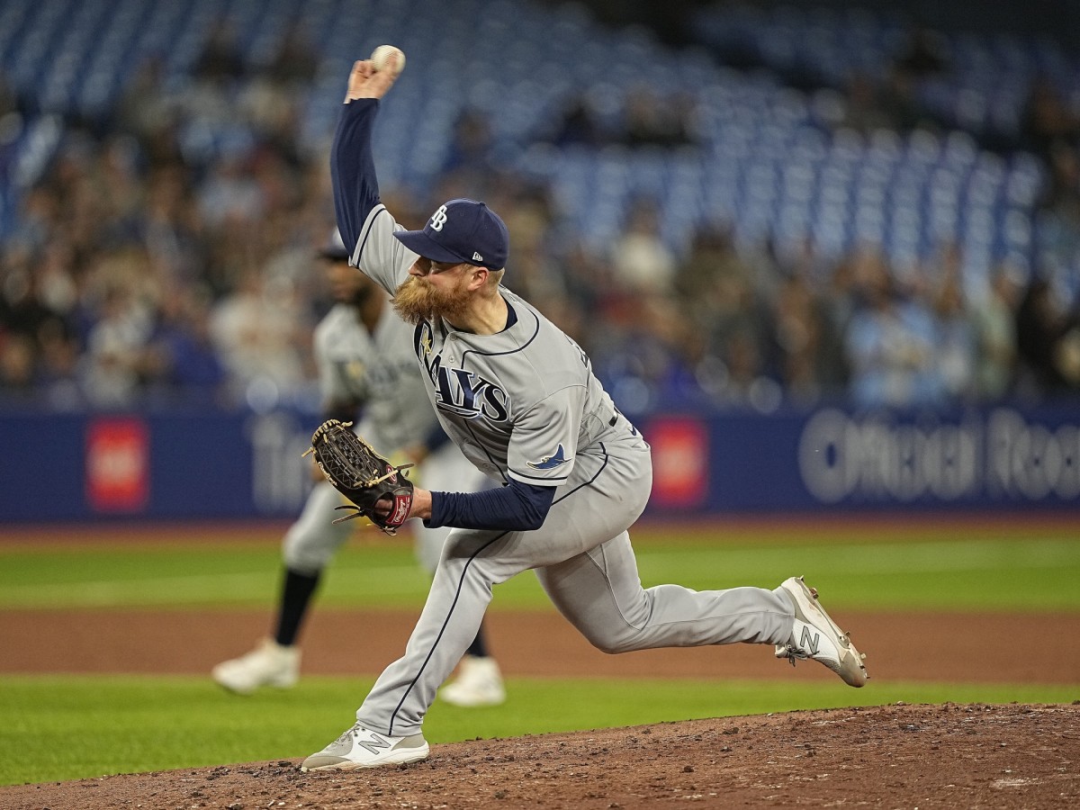 Tampa Bay Rays starting pitcher Drew Rasmussen (57) pitches to Toronto Blue Jays during the third inning at Rogers Centre. Mandatory Credit: John E. Sokolowski-USA TODAY Sports