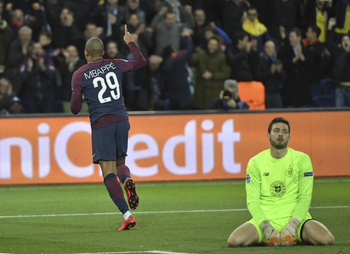 Kylian Mbappe pictured celebrating a Champions League goal for PSG against Celtic in 2017