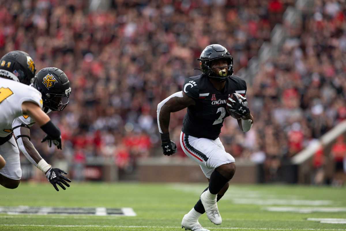 Cincinnati Bearcats running back Corey Kiner (2) runs toward the end zone for a touchdown during the third quarter of the NCAA football game between the Cincinnati Bearcats and the Kennesaw State Owls at Nippert Stadium in Cincinnati on Saturday, Sept. 10, 2022. Kennesaw State Owls At Cincinnati Bearcats Football