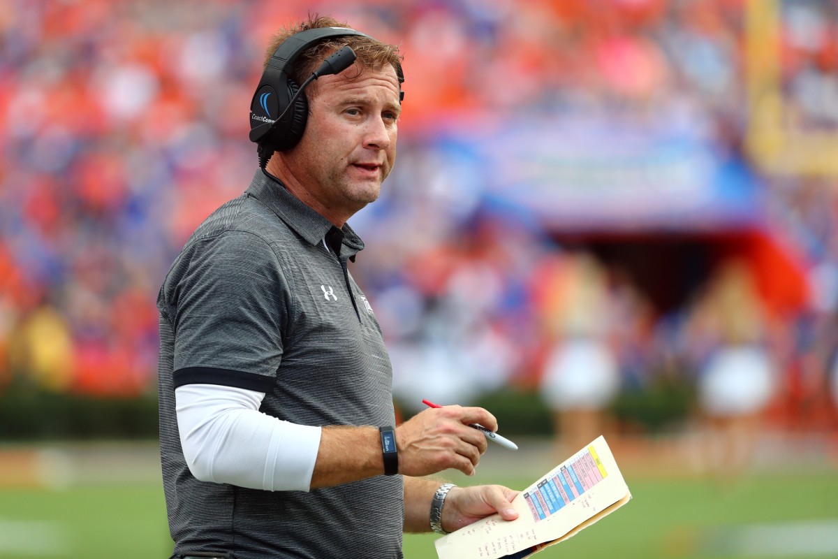 Sep 28, 2019; Gainesville, FL, USA; Towson Tigers head coach Rob Ambrose looks on against the Florida Gators during the second half at Ben Hill Griffin Stadium.