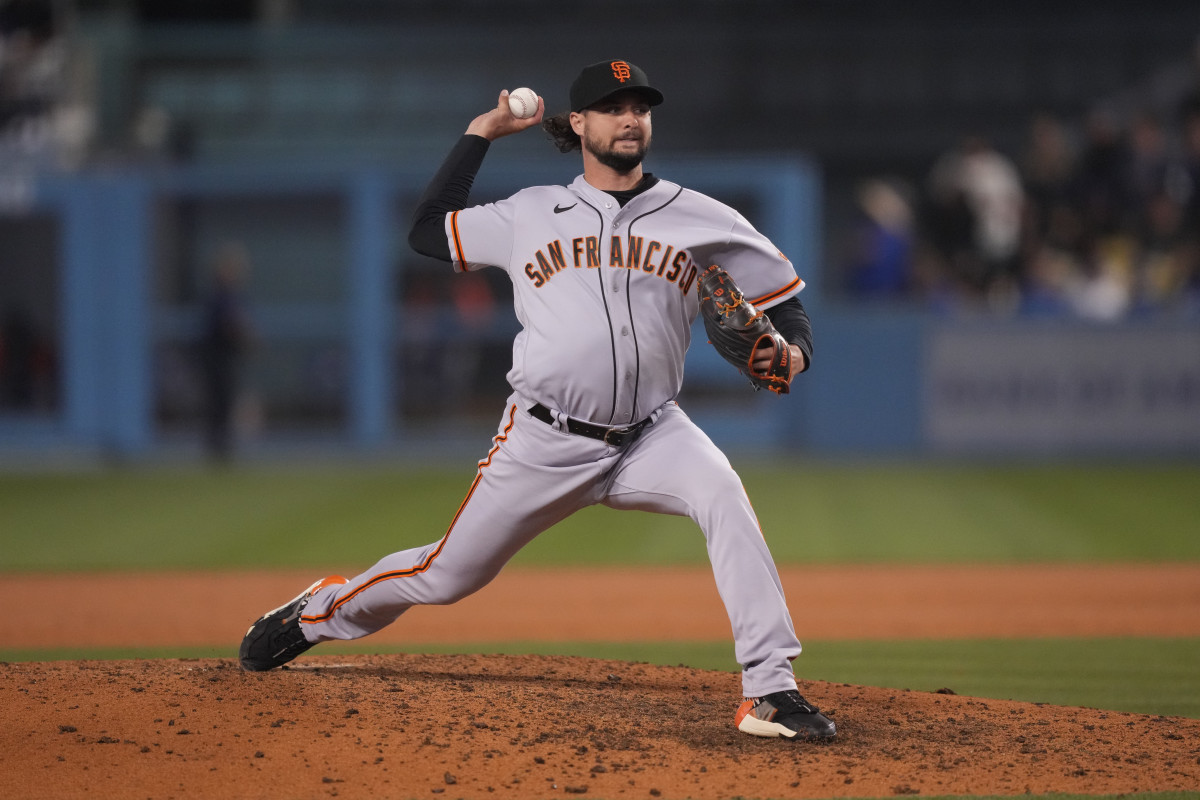 SF Giants pitcher Tyler Beede throws a pitch during spring training.