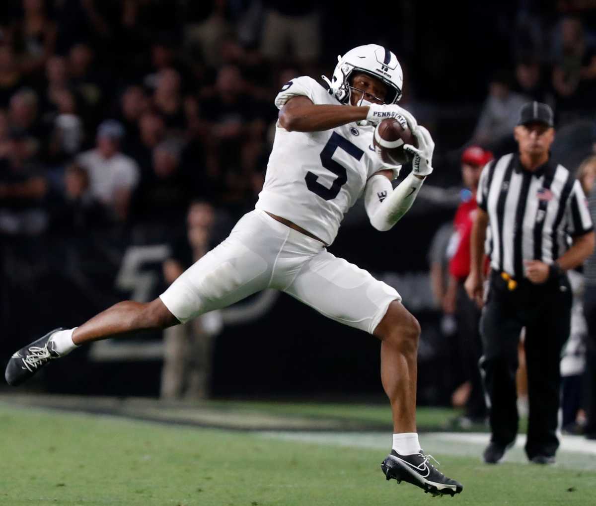 Penn State Nittany Lions wide receiver Mitchell Tinsley (5) catches a pass during the NCAA football game against the Purdue Boilermakers, Thursday, Sept. 1, 2022, at Ross-Ade Stadium in West Lafayette, Ind. Penn State won 35-31. Purduepennstatefb090122 Am00871