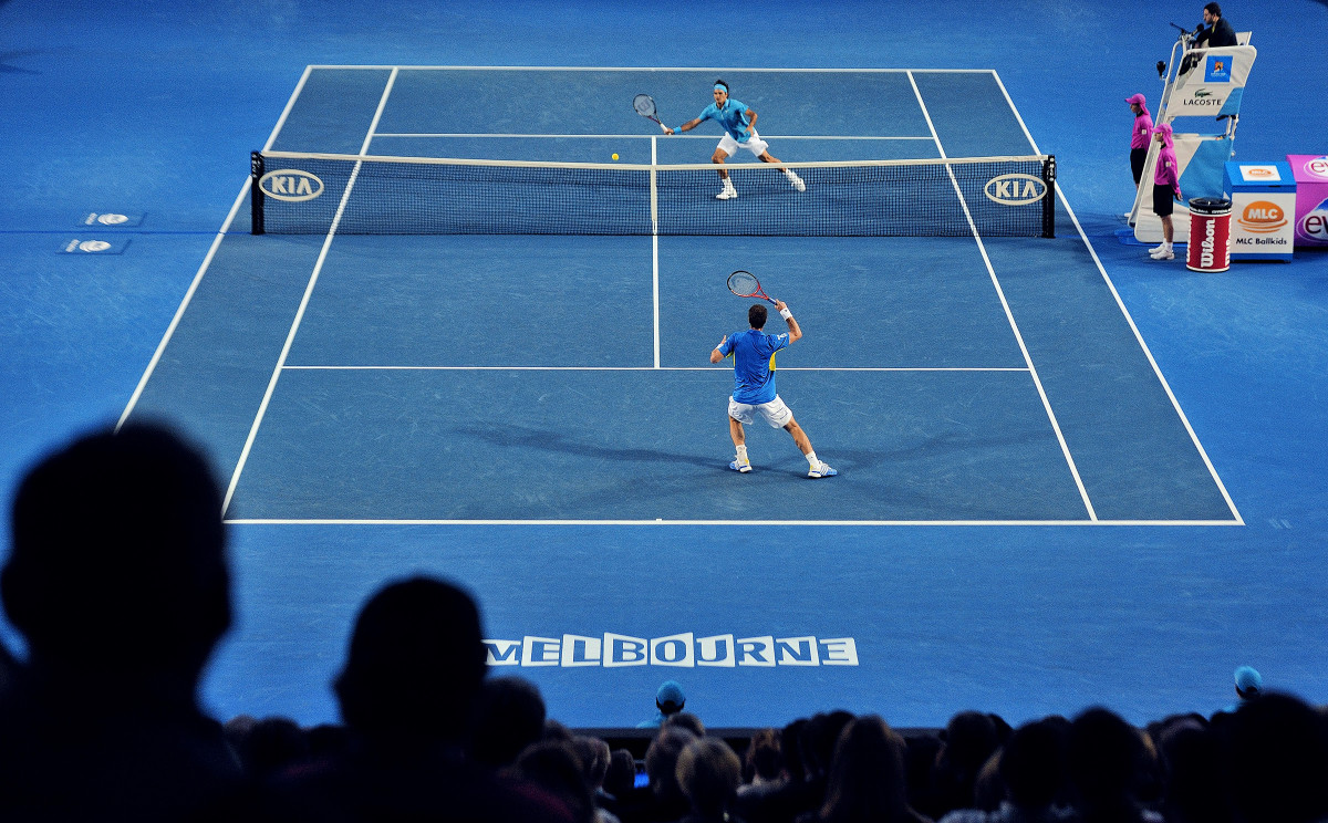 Roger Federer returns a shot against Andy Murray in the 2010 Australian Open final.