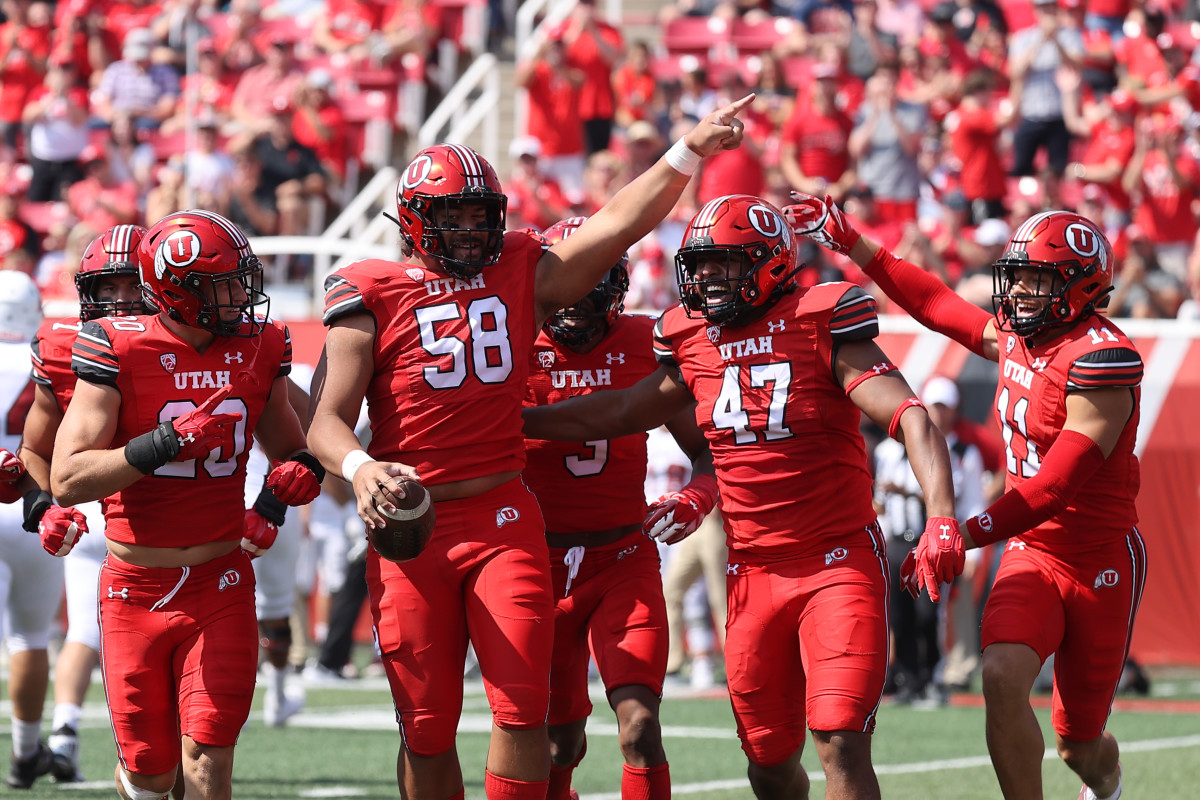 Utah Utes defensive tackle Junior Tafuna (58) reacts to an interception in the second quarter against the Southern Utah Thunderbirds at Rice-Eccles Stadium.
