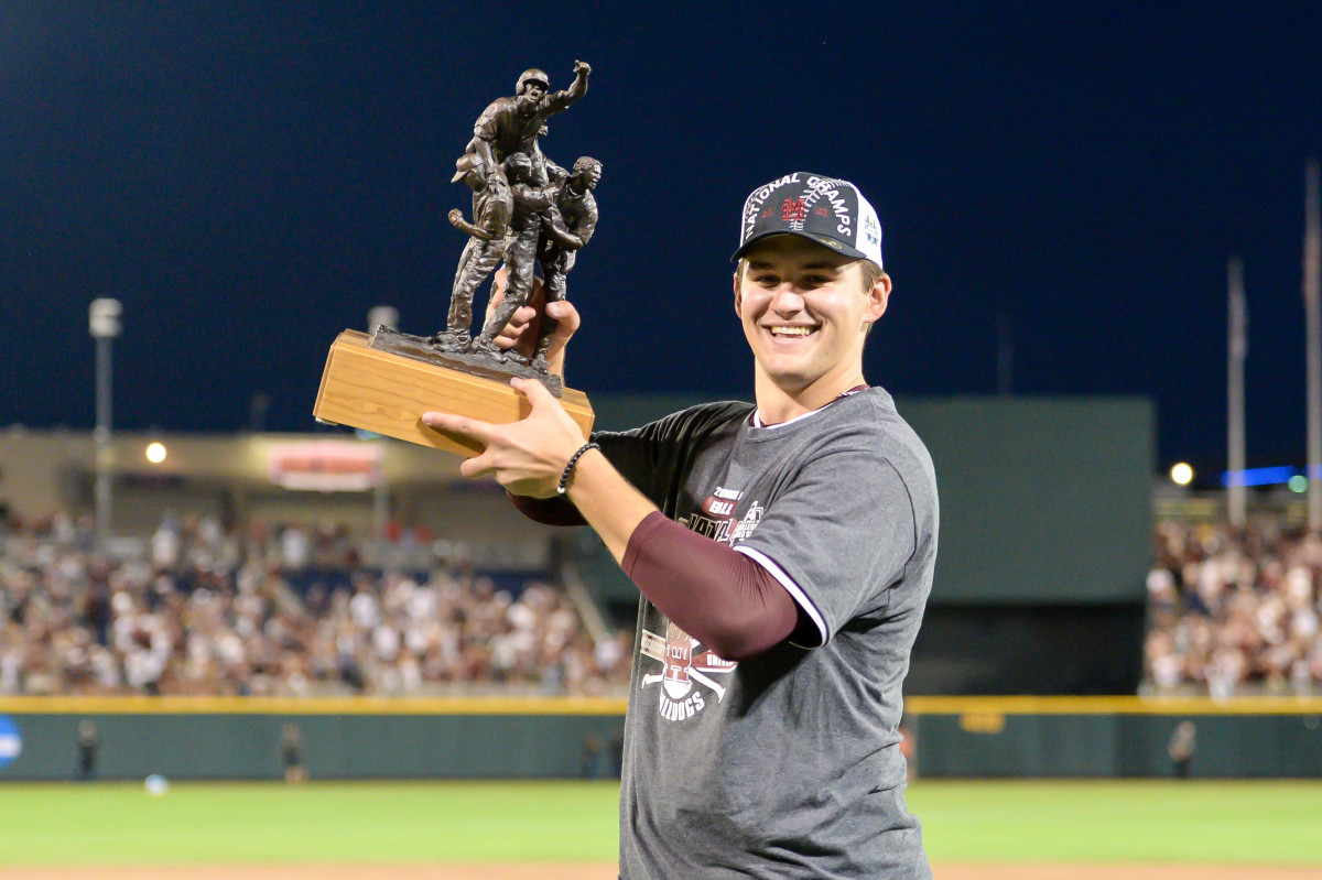 SF Giants prospect Will Bedna raises the most outstanding player award after leading Mississippi State over the Vanderbilt Commodores at TD Ameritrade Park.