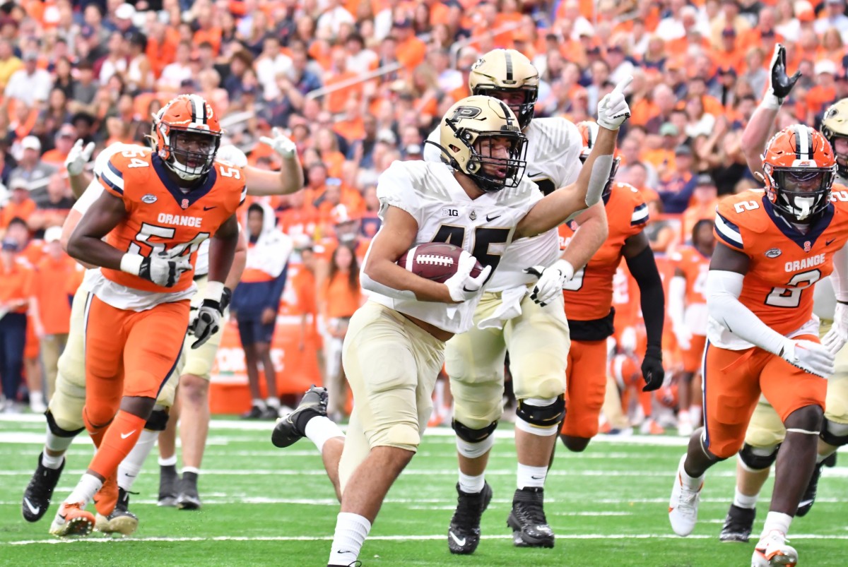 Sep 17, 2022; Syracuse, New York, USA; Purdue Boilermakers running back Devin Mockobee (45) runs for a touchdown against the Syracuse Orange in the first quarter at JMA Wireless Dome.