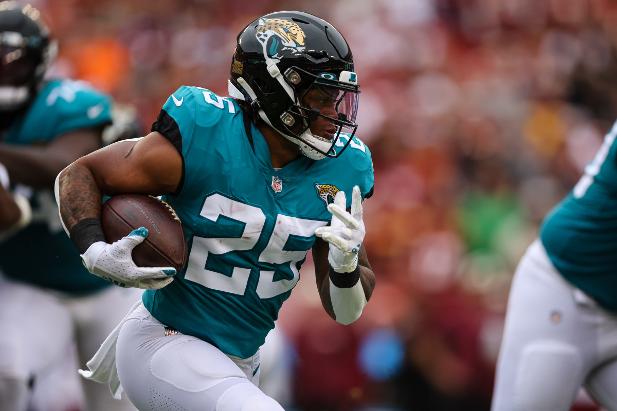 Sep 11, 2022; Landover, Maryland, USA; Jacksonville Jaguars running back James Robinson (25) carries the ball against the Washington Commanders during the first half at FedExField.