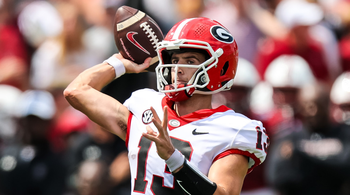 Georgia Bulldogs quarterback Stetson Bennett (13) passes against the South Carolina Gamecocks in the second quarter at Williams-Brice Stadium on Sept. 17, 2022.