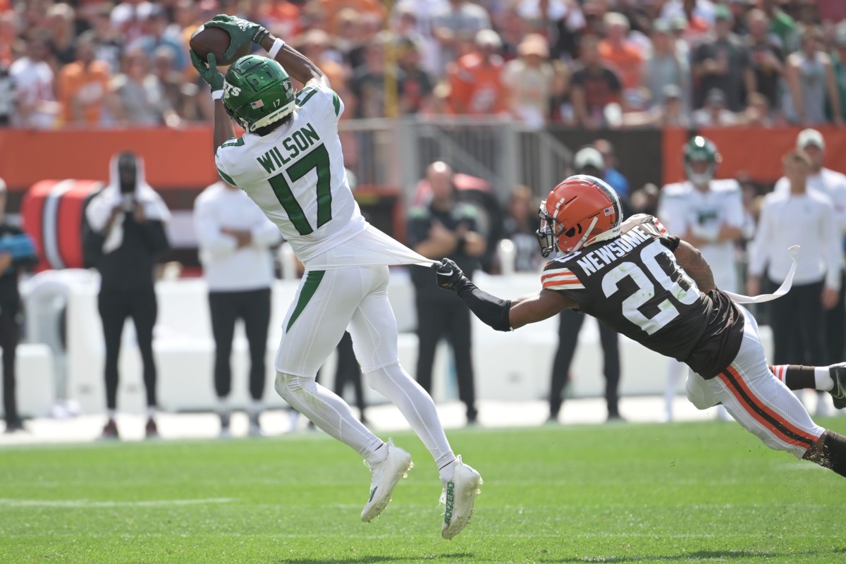 Sep 18, 2022; Cleveland, Ohio, USA; New York Jets wide receiver Garrett Wilson (17) catches a pass as Cleveland Browns cornerback Greg Newsome II (20) defends during the first half at FirstEnergy Stadium. Mandatory Credit: Ken Blaze-USA TODAY Sports