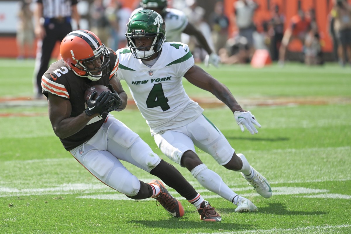 Sep 18, 2022; Cleveland, Ohio, USA; Cleveland Browns wide receiver Amari Cooper (2) catches a pass in front of New York Jets cornerback D.J. Reed (4) during the second half at FirstEnergy Stadium. Mandatory Credit: Ken Blaze-USA TODAY Sports