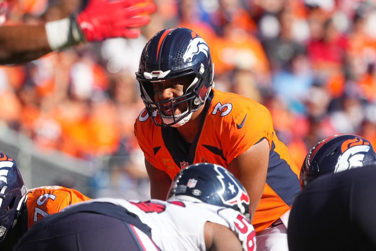 Denver Broncos quarterback Russell Wilson (3) calls out in the third quarter against the Houston Texans at Empower Field at Mile High.