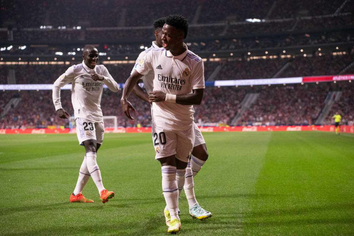 No.20 Vinicius Junior pictured dancing after Real Madrid teammate (not in shot) scored against Atletico Madrid in September 2022