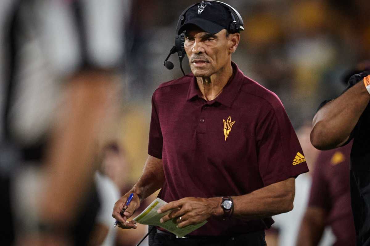 Arizona State Sun Devils head coach Herm Edwards walks the sidelines as his team plays the Eastern Michigan Eagles at Sun Devil Stadium in Tempe.