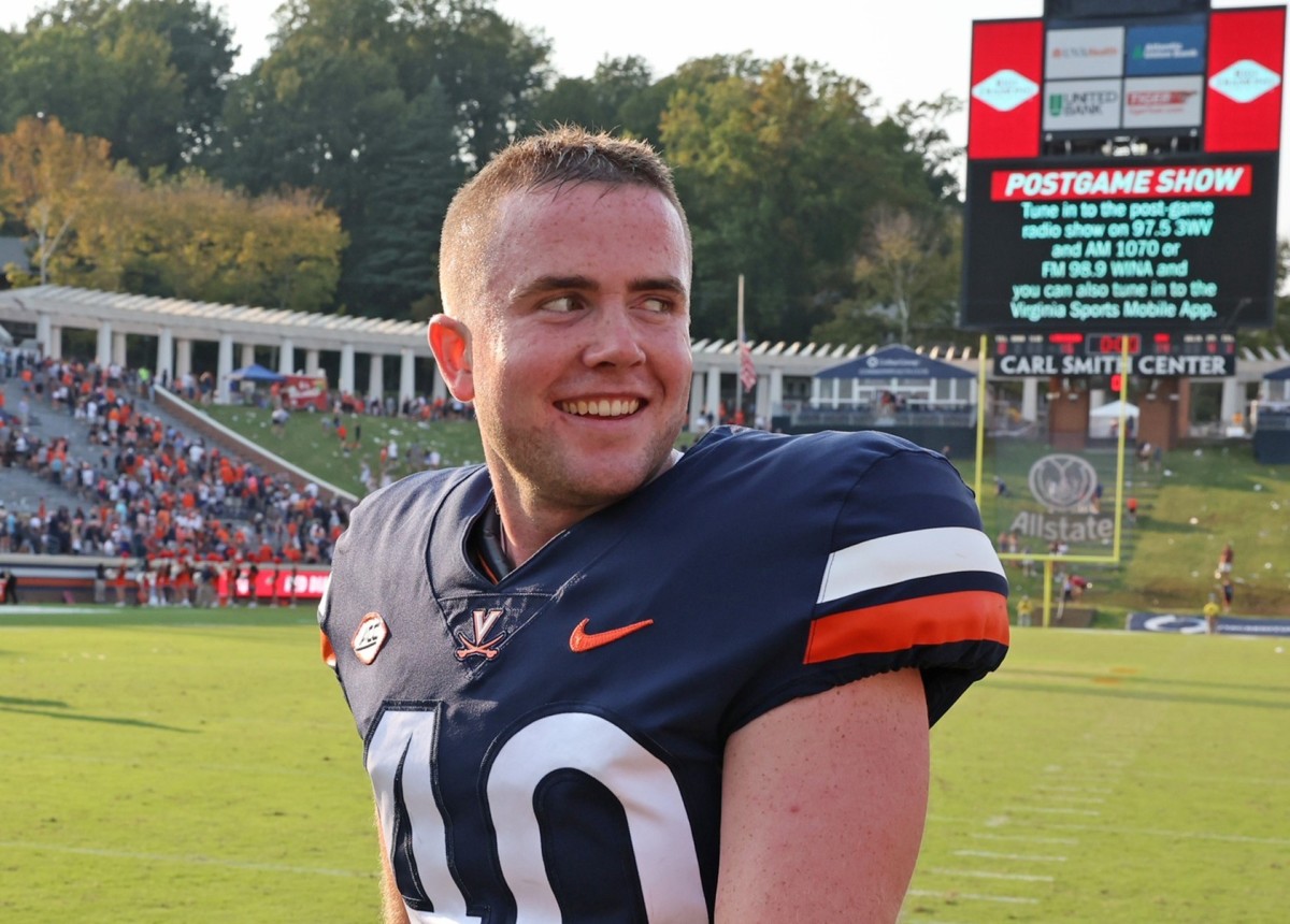 Virginia Cavaliers kicker Brendan Farrell walks off the field after making the game-winning field goal against the Old Dominion Monarchs.