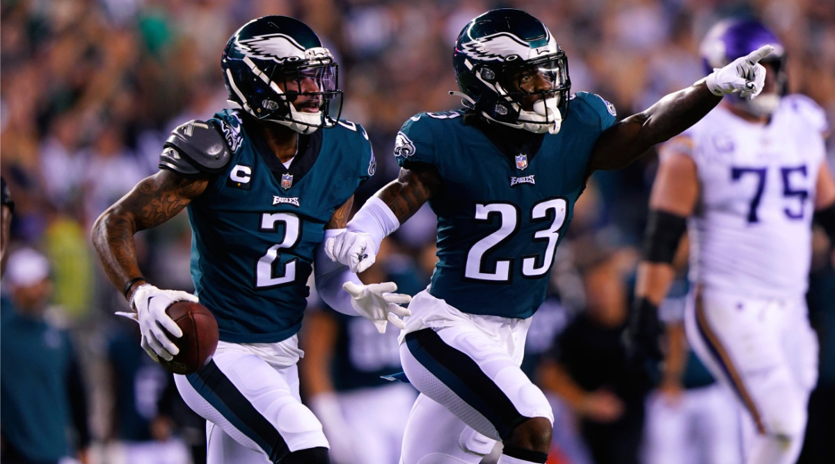 Philadelphia Eagles cornerback Darius Slay (2) celebrates with teammate safety C.J. Gardner-Johnson (23) after intercepting a pass during the second half of an NFL football game against the Minnesota Vikings, Monday, Sept. 19, 2022, in Philadelphia. (AP Photo/Chris Szagola)