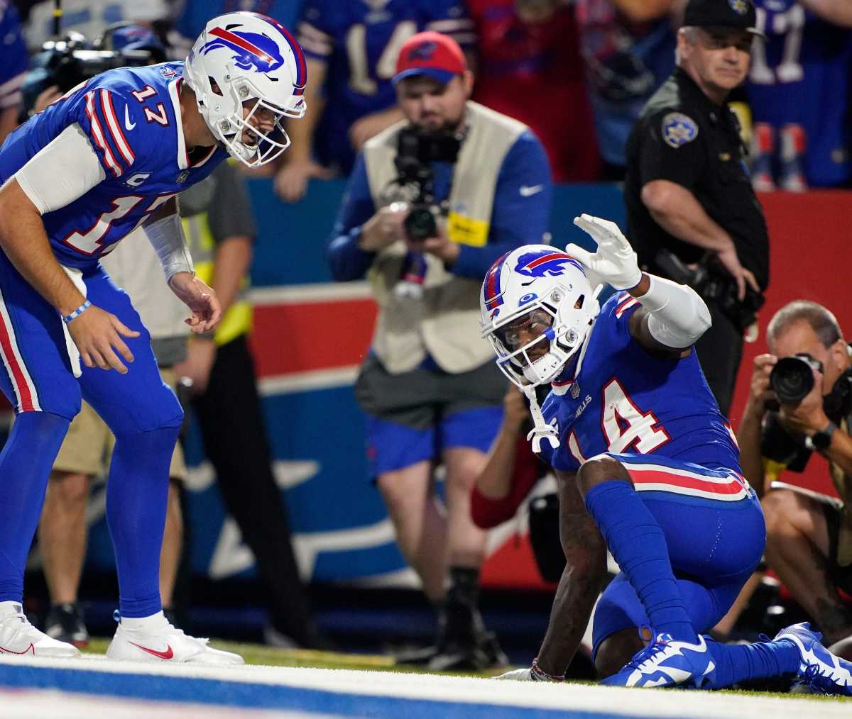 Buffalo Bills quarterback Josh Allen (17) and wide receiver Stefon Diggs (14) celebrate a touch down during the third quarter at Highmark Stadium.