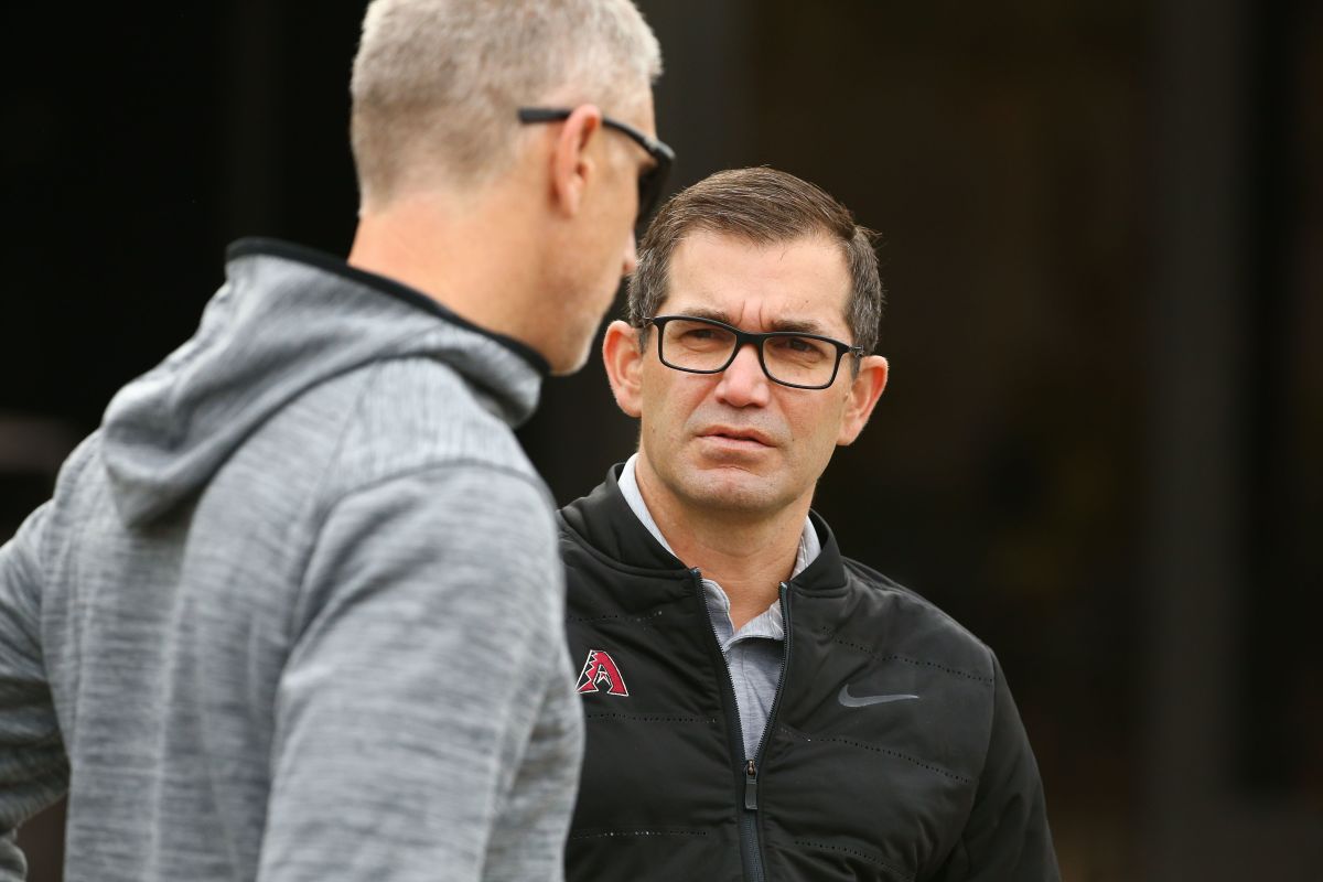 Amiel Sawdaye, (right) Senior VP & Assistant GM talks to Michael Bell, Director of Player Development for the Arizona Diamondbacks during the first day of spring training
