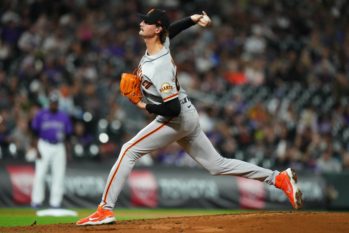 SF Giants pitcher Sean Hjelle throws a pitch against the Rockies.
