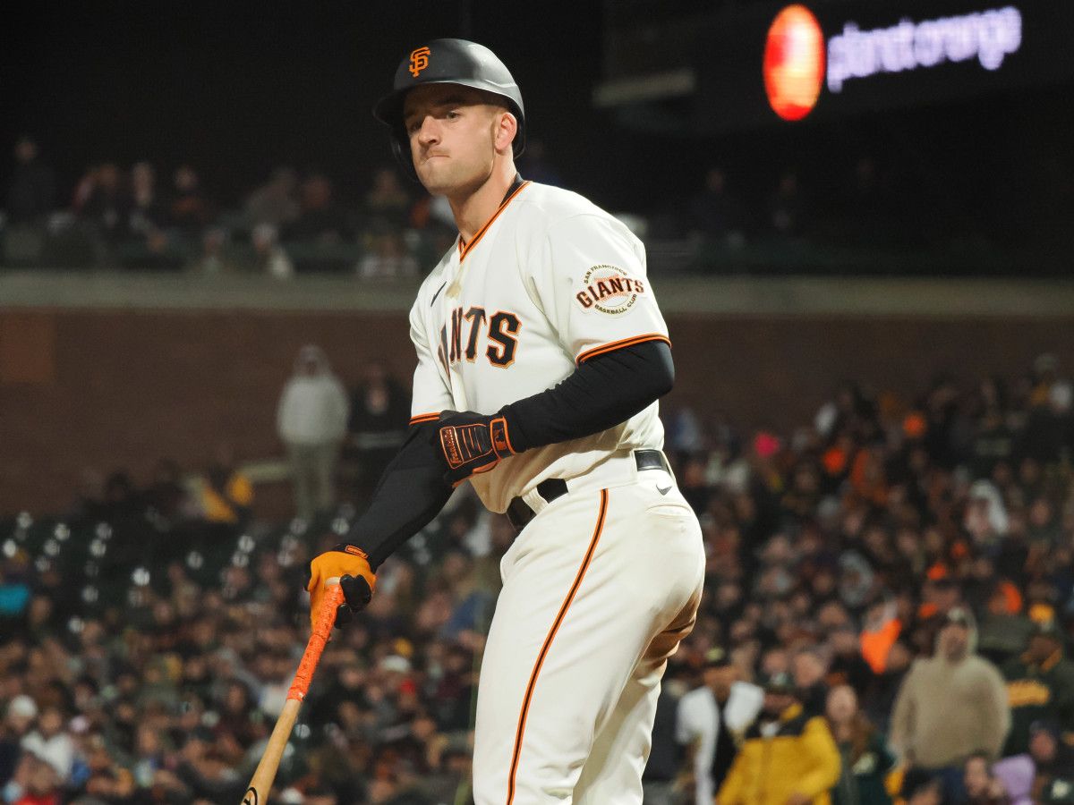 SF Giants infielder Jason Vosler tosses his bat after earning a walk. (2022)