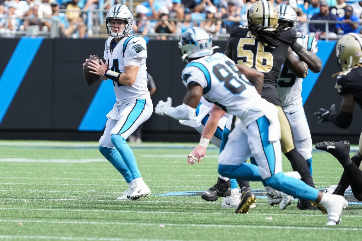 Sep 19, 2021; Carolina Panthers quarterback Sam Darnold (14) drops back to pass against the New Orleans Saints. Mandatory Credit: Jim Dedmon-USA TODAY Sports