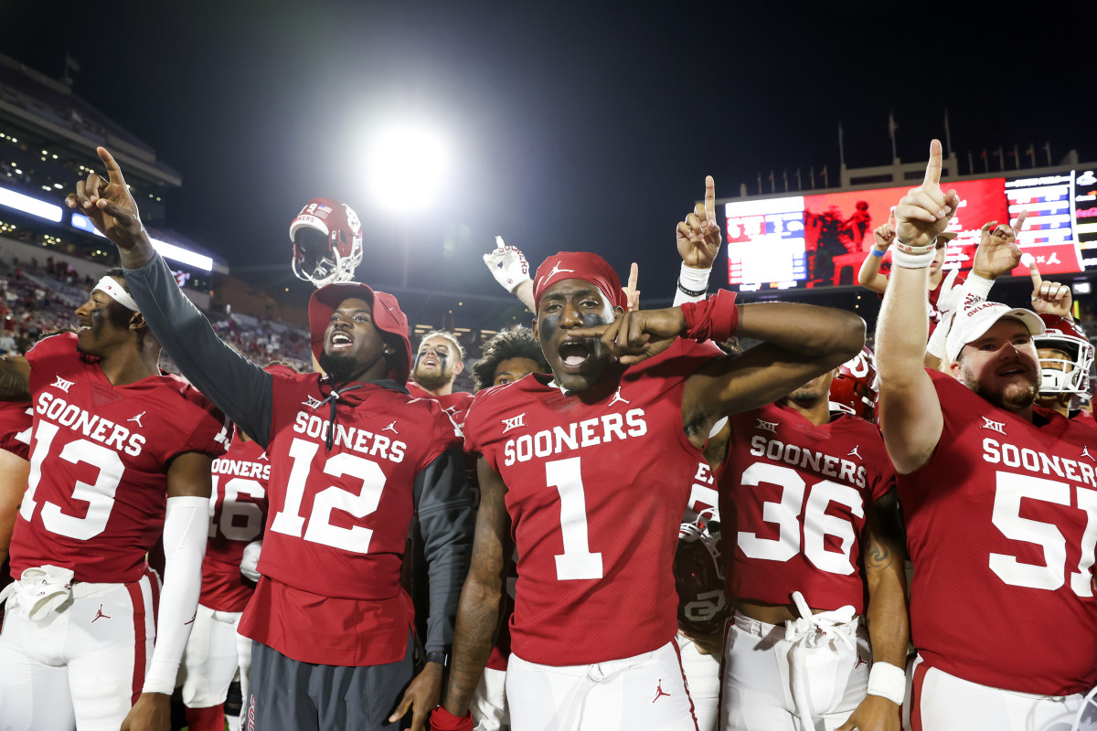 OU players sing the alma mater to the crowd after beating Kent State.