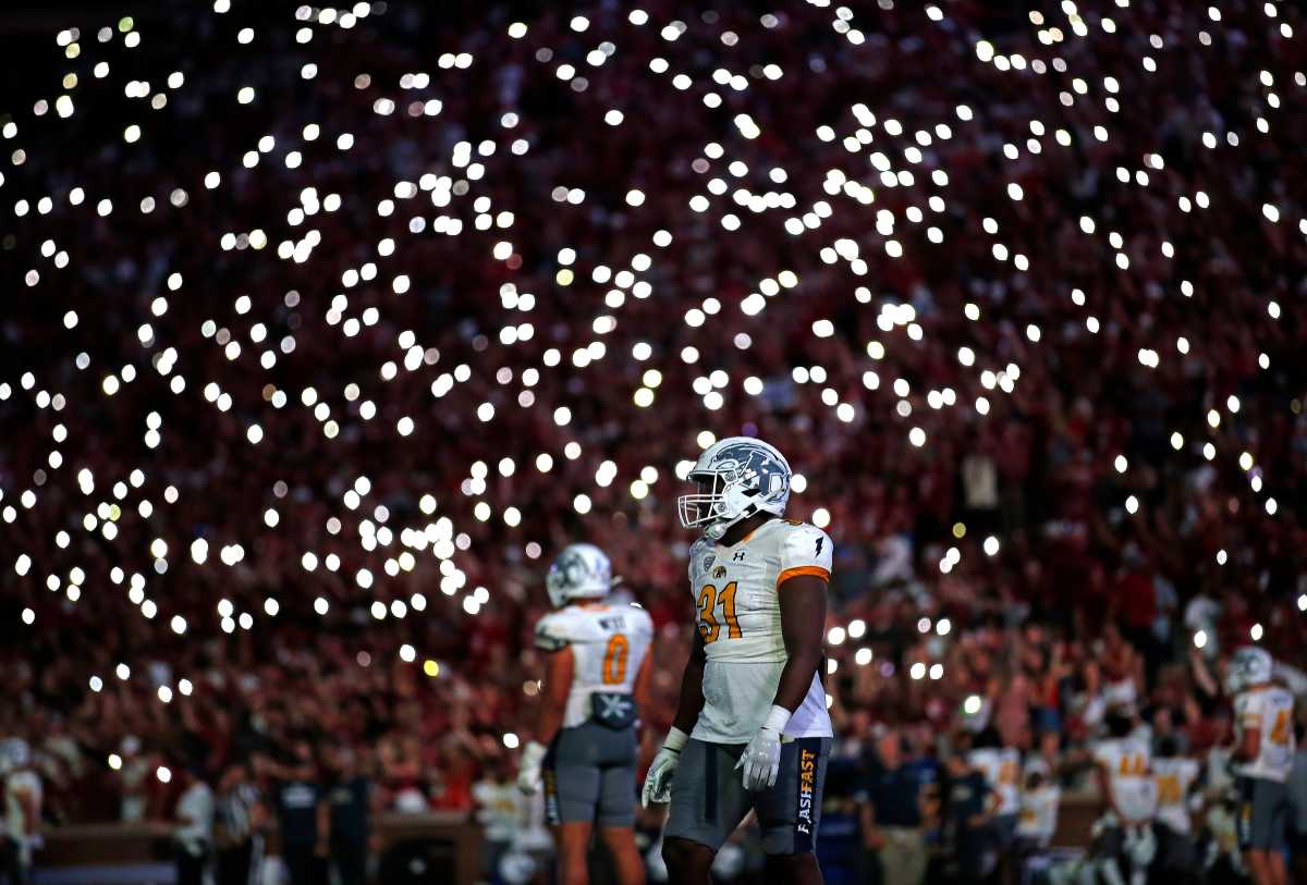 Fans light up Owen Field with their cell phones against Kent State.