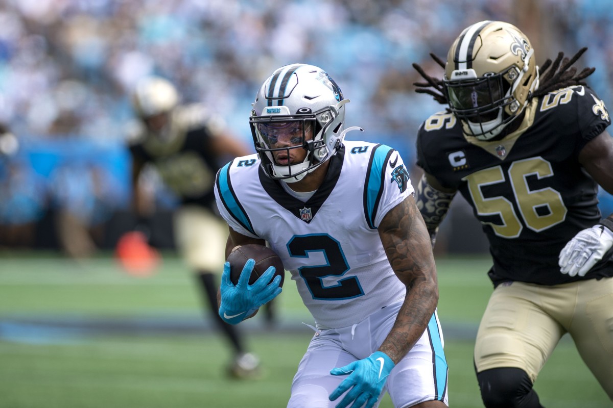 Carolina Panthers receiver D.J. Moore (2) with the ball as New Orleans Saints linebacker Demario Davis (56) chases. Mandatory Credit: Bob Donnan-USA TODAY Sports
