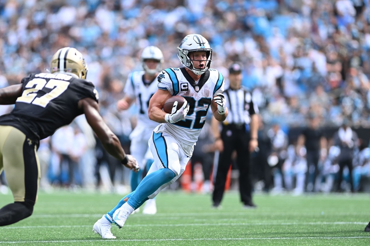 Sep 19, 2021; Carolina Panthers running back Christian McCaffrey (22) runs for a touchdown against the New Orleans Saints. Mandatory Credit: Bob Donnan-USA TODAY Sports