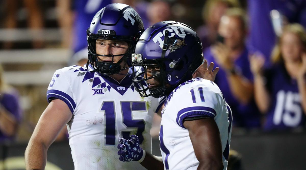 Sep 2, 2022; Boulder, Colorado, USA; TCU Horned Frogs wide receiver Derius Davis (11) celebrates his touchdown with quarterback Max Duggan (15) in the fourth quarter against the Colorado Buffaloes at Folsom Field.