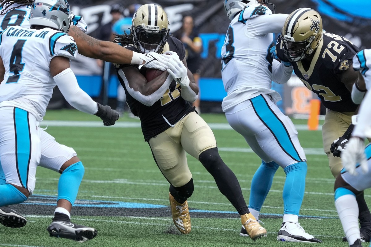 Sep 19, 2021; New Orleans Saints running back Alvin Kamara (41) is stopped for no gain against the Carolina Panthers. Mandatory Credit: Jim Dedmon-USA TODAY Sports