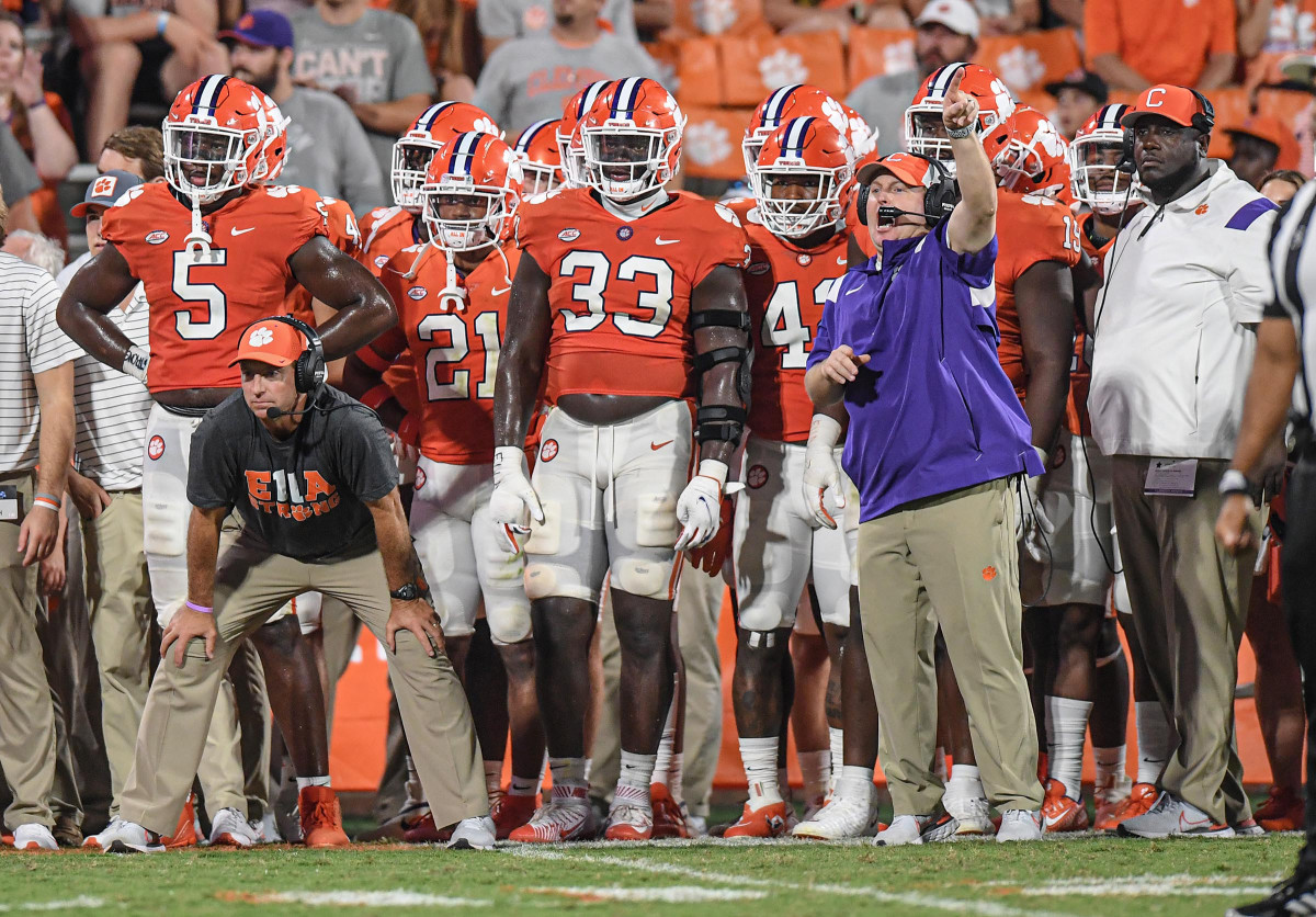 Sep 17, 2022; Clemson, South Carolina, USA; Clemson Tigers co-defensive coordinator Wes Goodwin (right) and head coach Dabo Swinney look on during the fourth quarter against the Louisiana Tech Bulldogs at Memorial Stadium. Mandatory Credit: Ken Ruinard-USA TODAY Sports